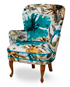 Mia armchair fabric Paradise turquoise, legs in cheery, lased. Made in Sweden.